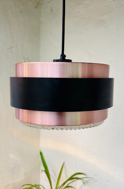 Iconic Saturn pendant in copper and black metal