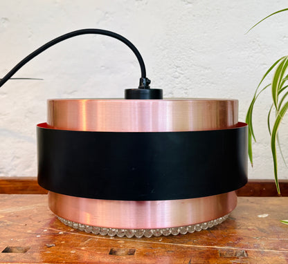 Iconic Saturn pendant in copper and black metal