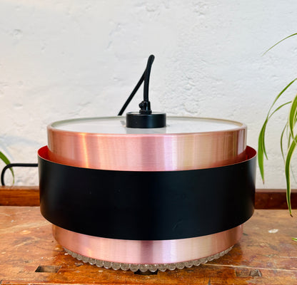Iconic Saturn pendant in copper and black metal